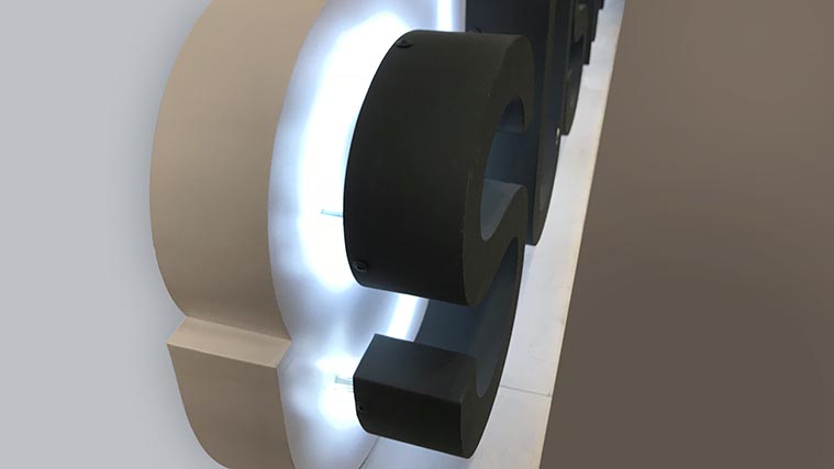 Aluminum channel letters with spacers