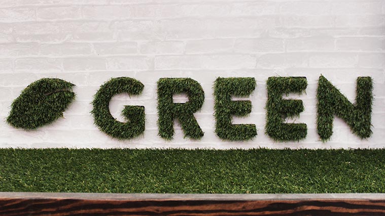 Artificial grass sign