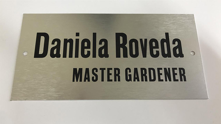 Brushed aluminum sign