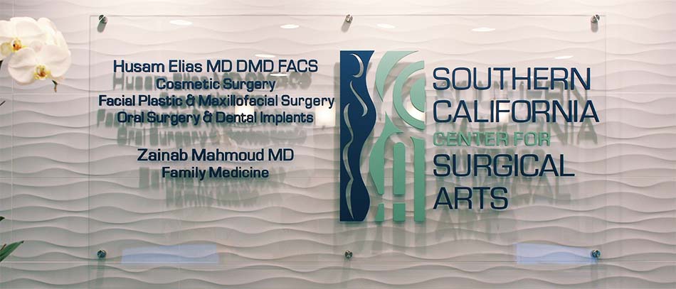 Surgical Arts name plate on clear acrylic