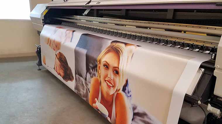 Durable banner printing with UV inks