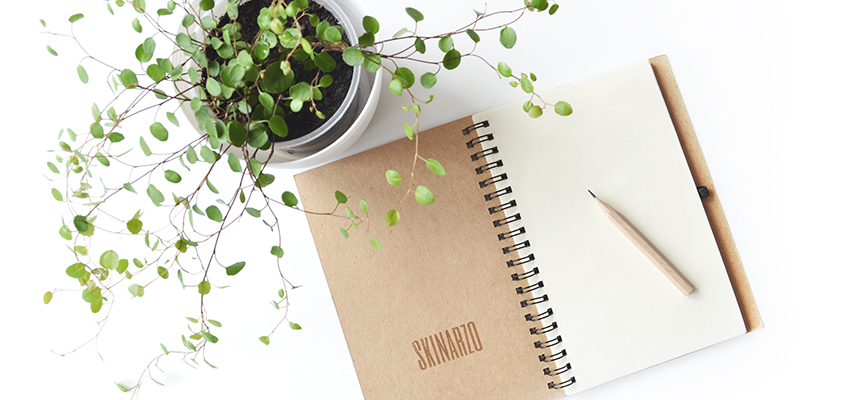 Eco-friendly notepad displaying the brand name