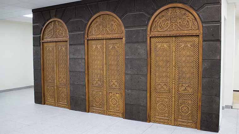Engraved wooden doors