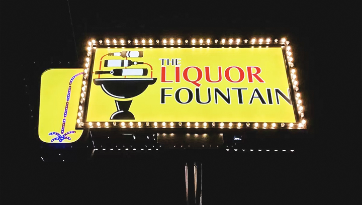The Liquor Fountain led pylon sign with external illumination made of aluminum and acrylic