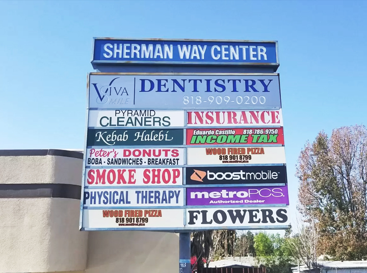 outdoor pylon sign design with multiple brand names made of Lexan and opaque vinyl