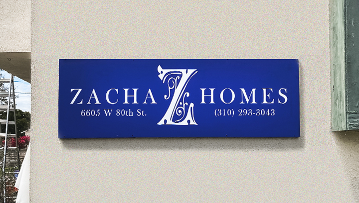 Zacha Homes printed wooden sign in blue color made of plywood