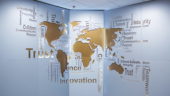 Ameriabank engraved aluminum sign displaying the world map for interior design