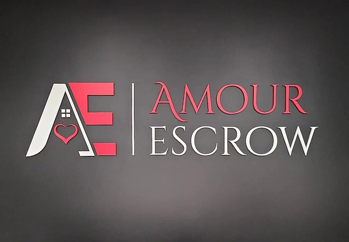 Amour Escrow acrylic sign in a custom style displaying the brand name and logo