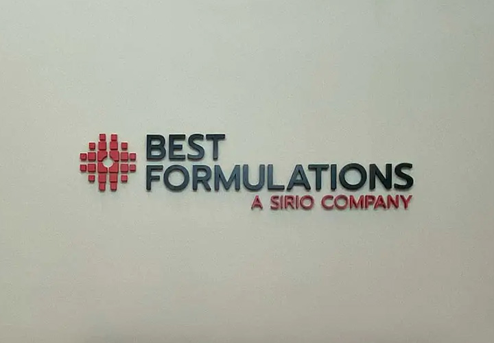 Best Formulations interior business sign displaying company name and logo made of acrylic