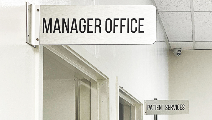 Manager Office brushed aluminum sign displaying the room name for lobby area wayfinding