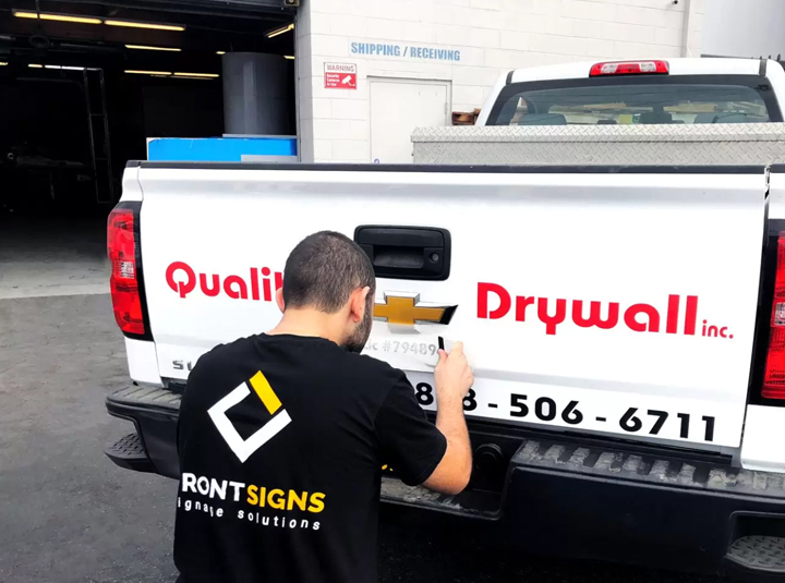 Quality Drywall inc. car graphics installation process