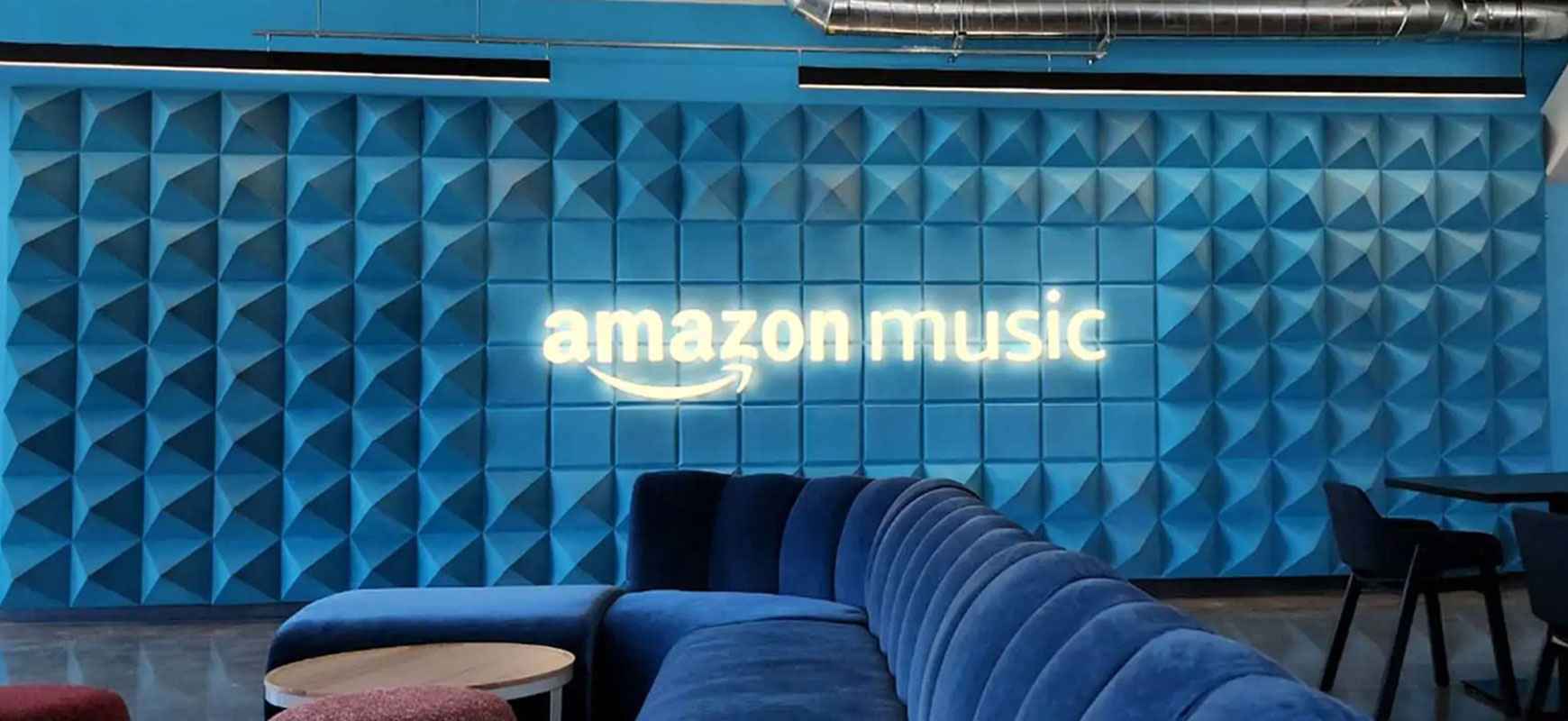 Channel letters reading Amazon Music, made of acrylic and aluminum, installed in an office