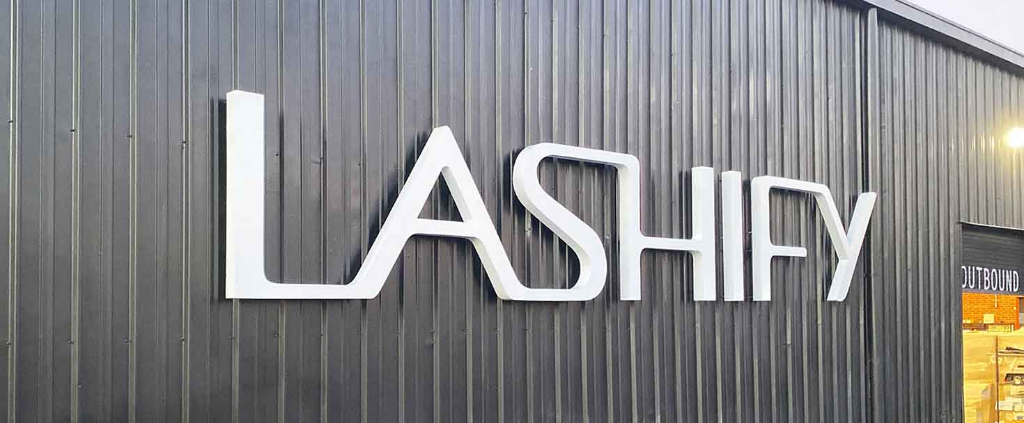 Channel letters for Lashify installed outdoors, made of aluminum and acrylic