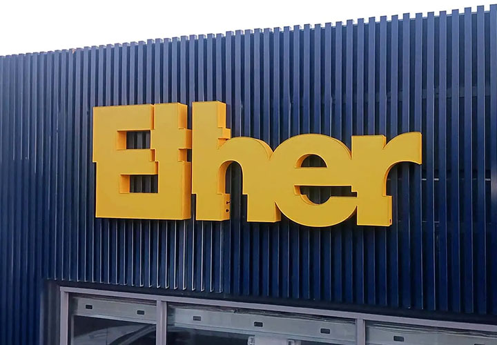 Ether channel letters in yellow spelling the company name made of acrylic and aluminum