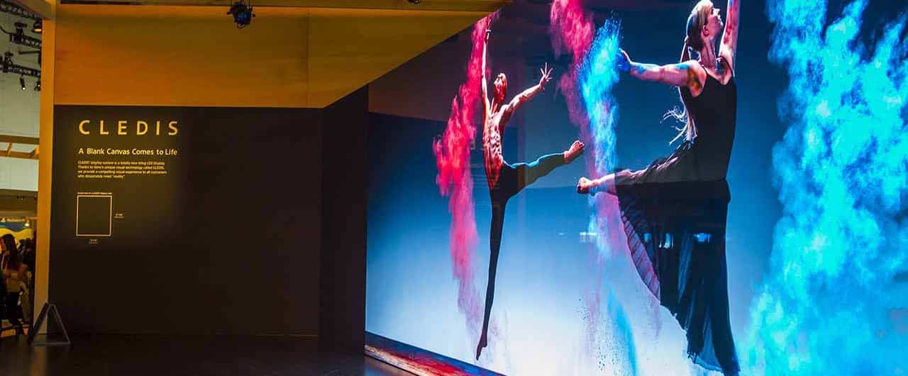 Cledis colorful trade show display with dancers printings