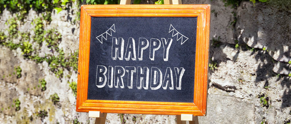 Happy birthday greeting chalkboard of wood