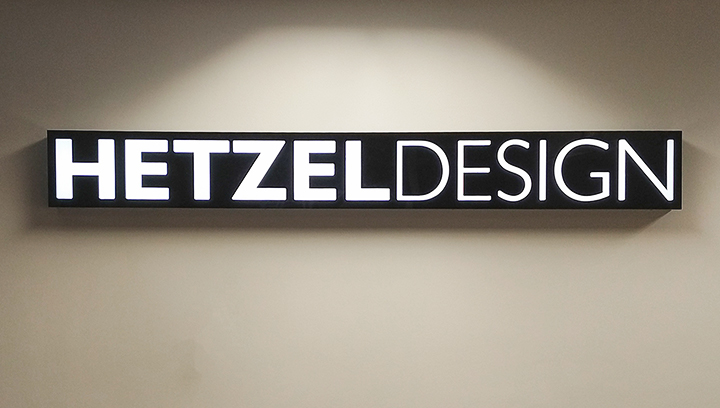 Hetzel Design office light box sign displaying the company name made of aluminum and acrylic