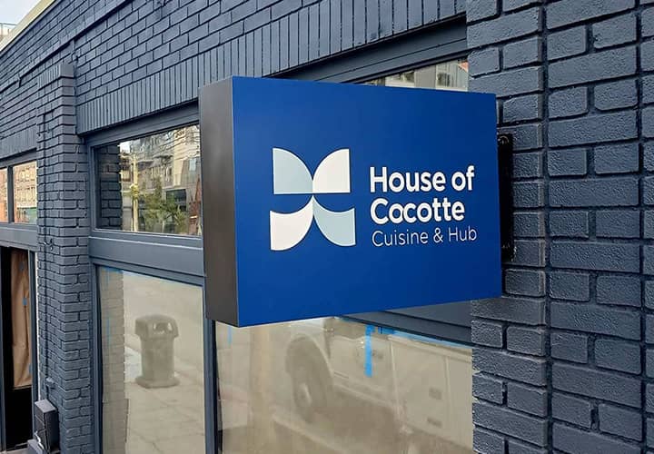 House of Cocotte Cuisine and Hub light box sign in wall-blade style made of Lexan and aluminum