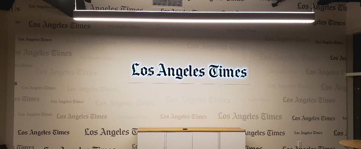 LA Times backlit interior signage made of opaque vinyl, acrylic, and aluminum for branding