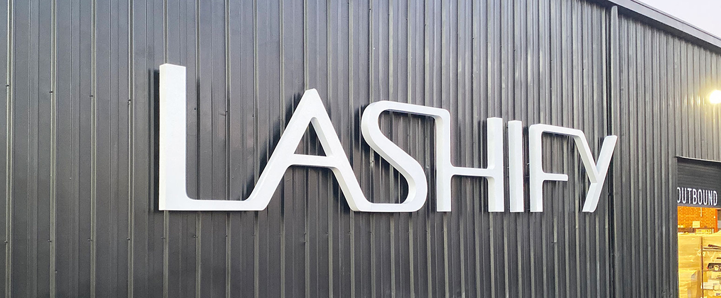 Lashify channel letters in big size displaying the brand name made of aluminum and acrylic