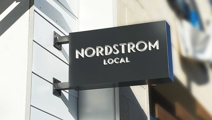 Nordstrom Local wall blade light box sign in black color made of aluminum and acrylic