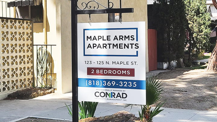 Conrad Property Management Inc. real estate PVC sign with a changeable slider