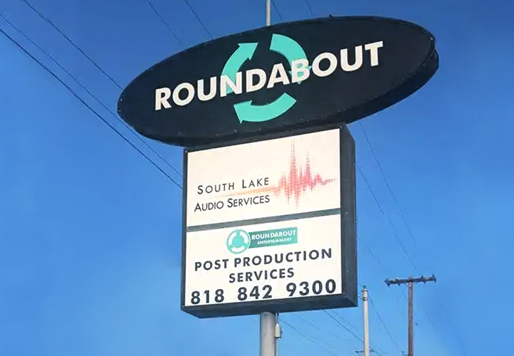 Roundabout Entertainment pylon sign displaying the business advertising made of lexan