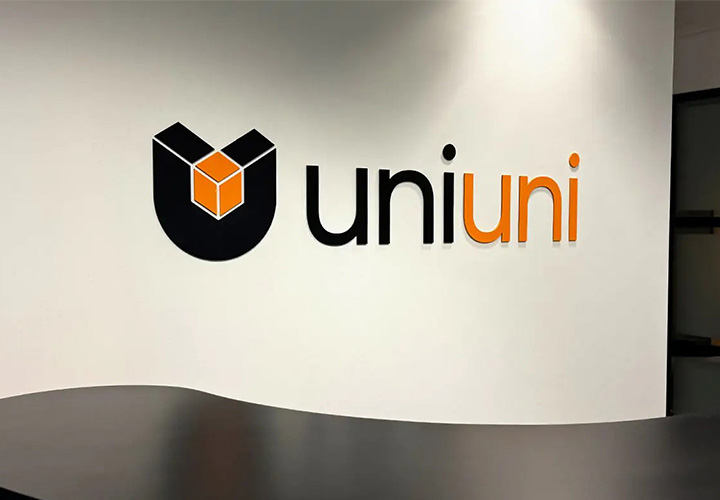 Uni Express Inc interior sign with the company name and logo made of acrylic for branding