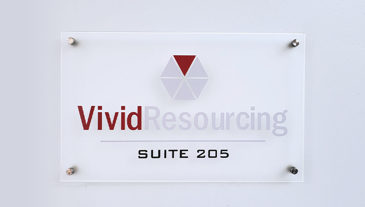 Vivid Resourcing plastic interior sign displaying the company name and logo made of acrylic
