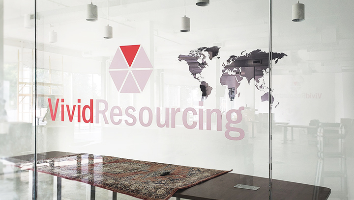 Vivid Resourcing office interior branding signs made of opaque vinyl displayed on the windows