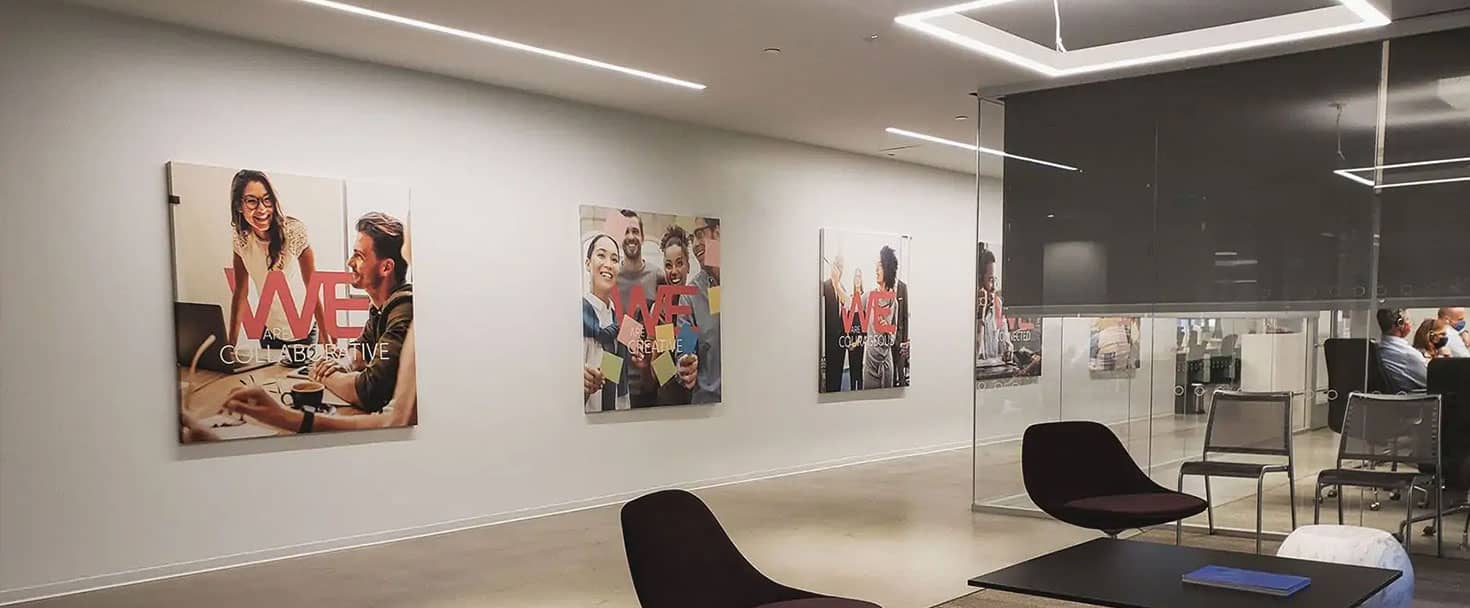 Wella Professionals canvas prints in a large size displaying team photos for interior branding