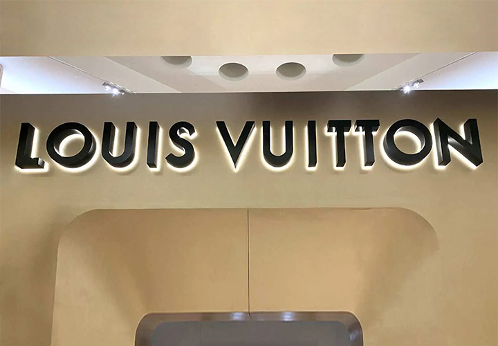 Louis Vuitton 3D logo sign in black with backlit illumination made of aluminum and acrylic