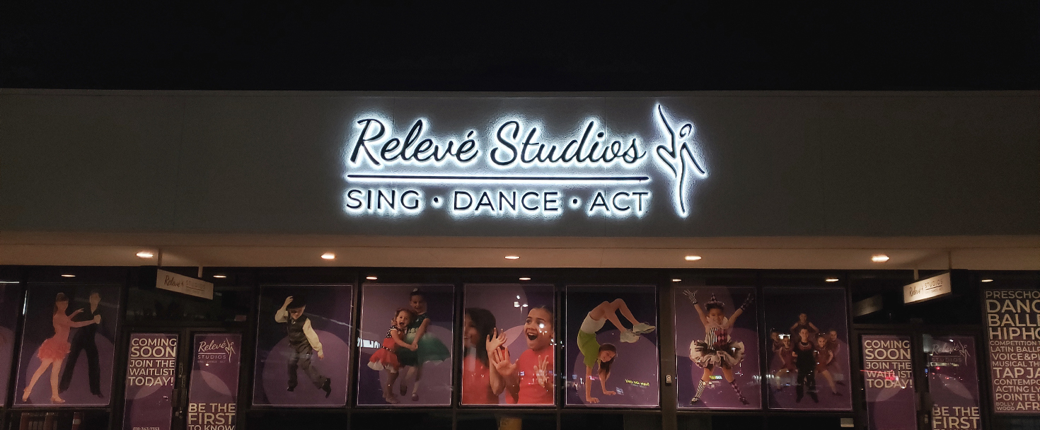 Releve Studios backlit 3d sign displaying the brand name made of aluminum