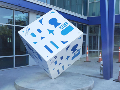 custom cube structure displayed outdoors