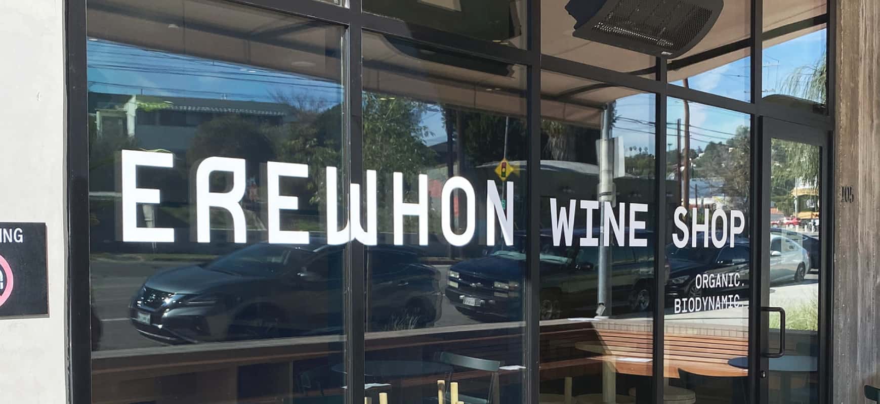 Erewhon Wine vinyl lettering spelling the brand name made of opaque vinyl for store branding