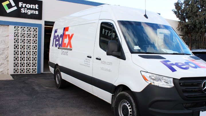 Fedex vinyl lettering in a promotional style made of opaque vinyl for branding the company car