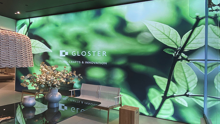 Gloster custom signage of a natural scene made of aluminum and a backlit banner