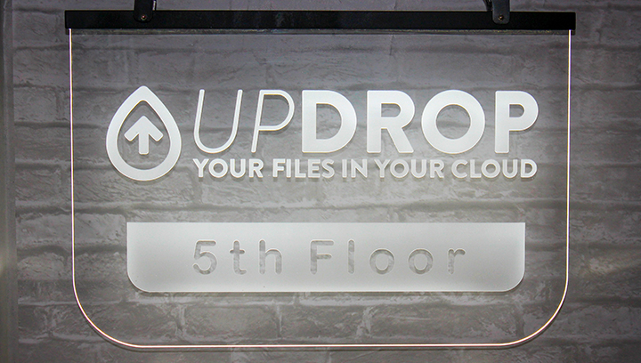 Updrop brand business light up sign with edge illumination of an engraved text on acrylic