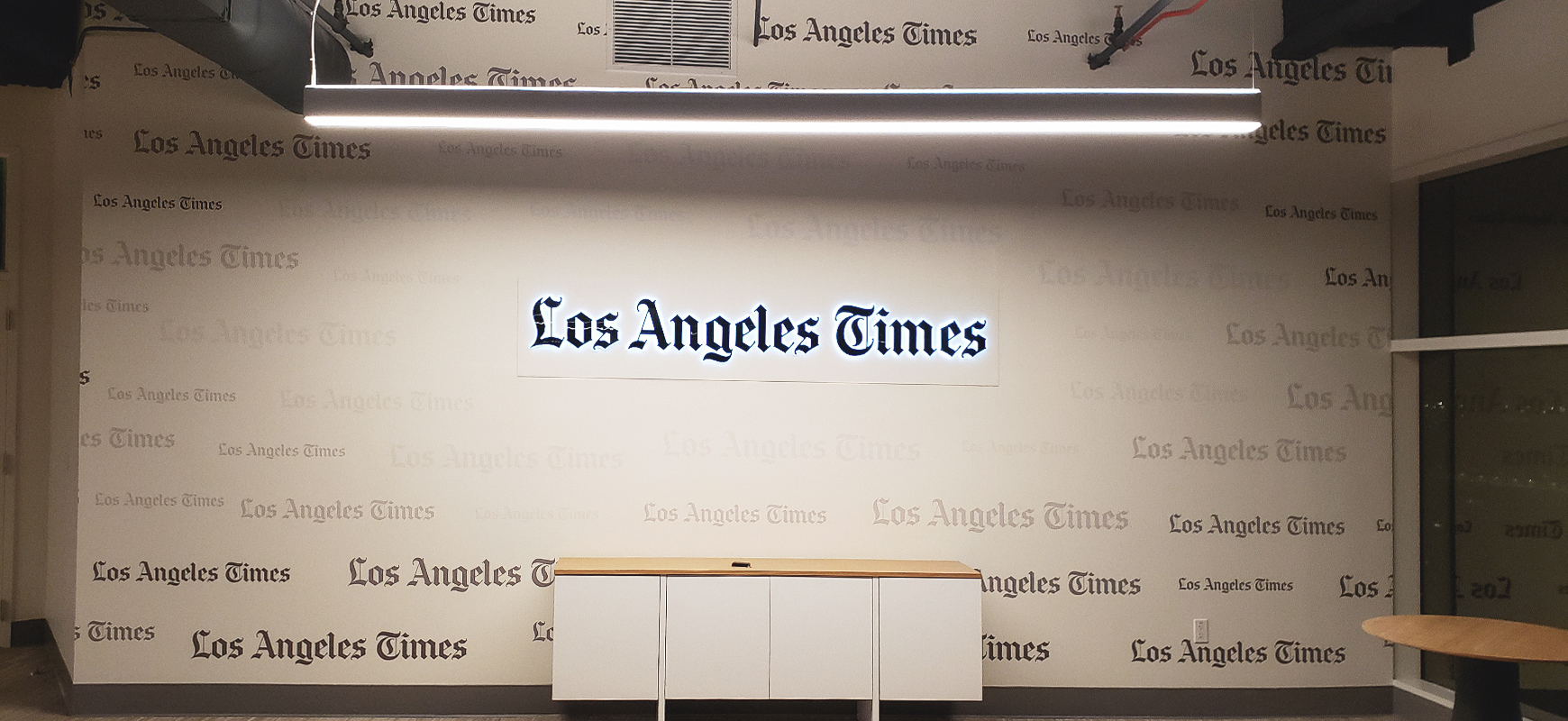 LA Times backlit sign displaying the brand name made of opaque vinyl, aluminum, and acrylic