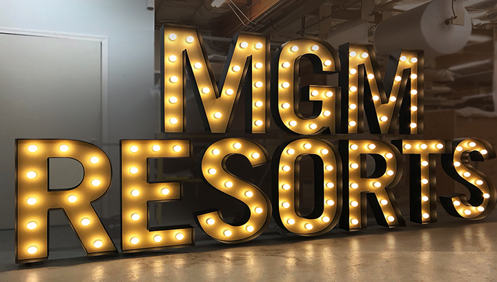 MGM Resorts light up sign in marquee style aluminum displaying the brand name