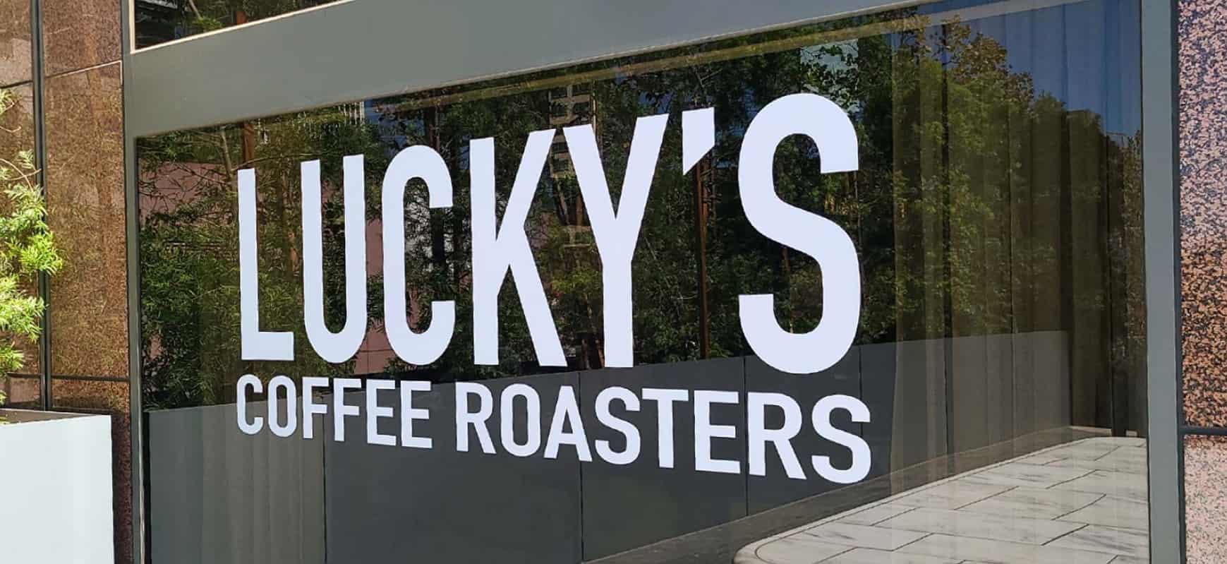 Lucky's Coffee Roasters vinyl lettering in large sizes made of opaque vinyl for window branding