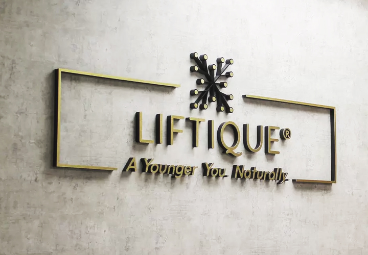 Liftique office sign with branding elements in acrylic and aluminum intended for lobby branding