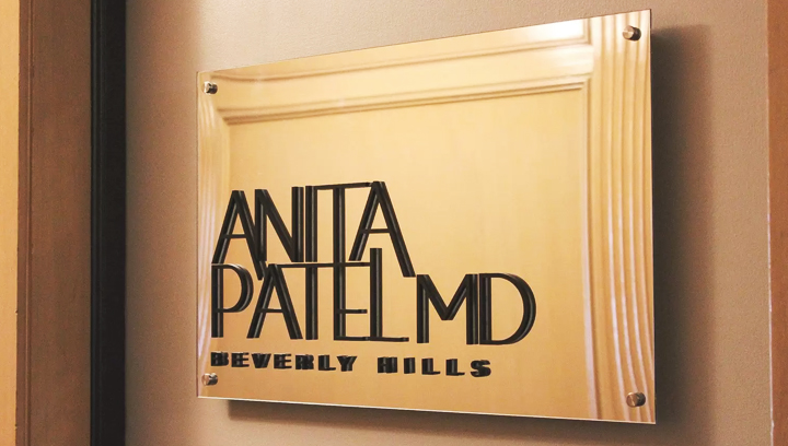 Anita Patel MD office nameplate displaying the person's name and position made of acrylic