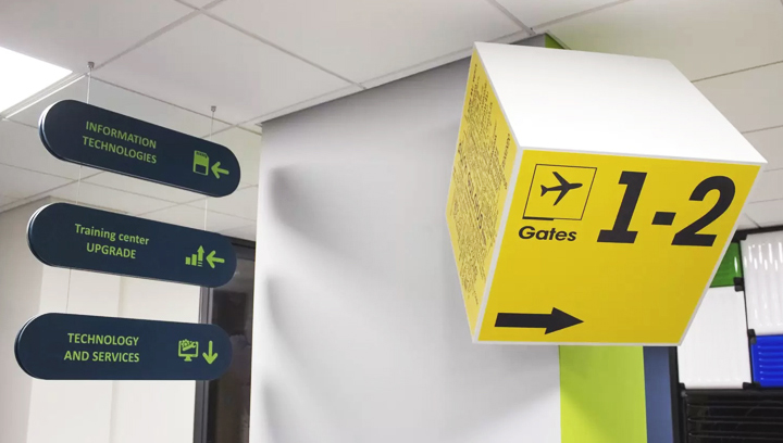 custom office wayfinding signs in yellow and dark blue colors made of PVC and opaque vinyl