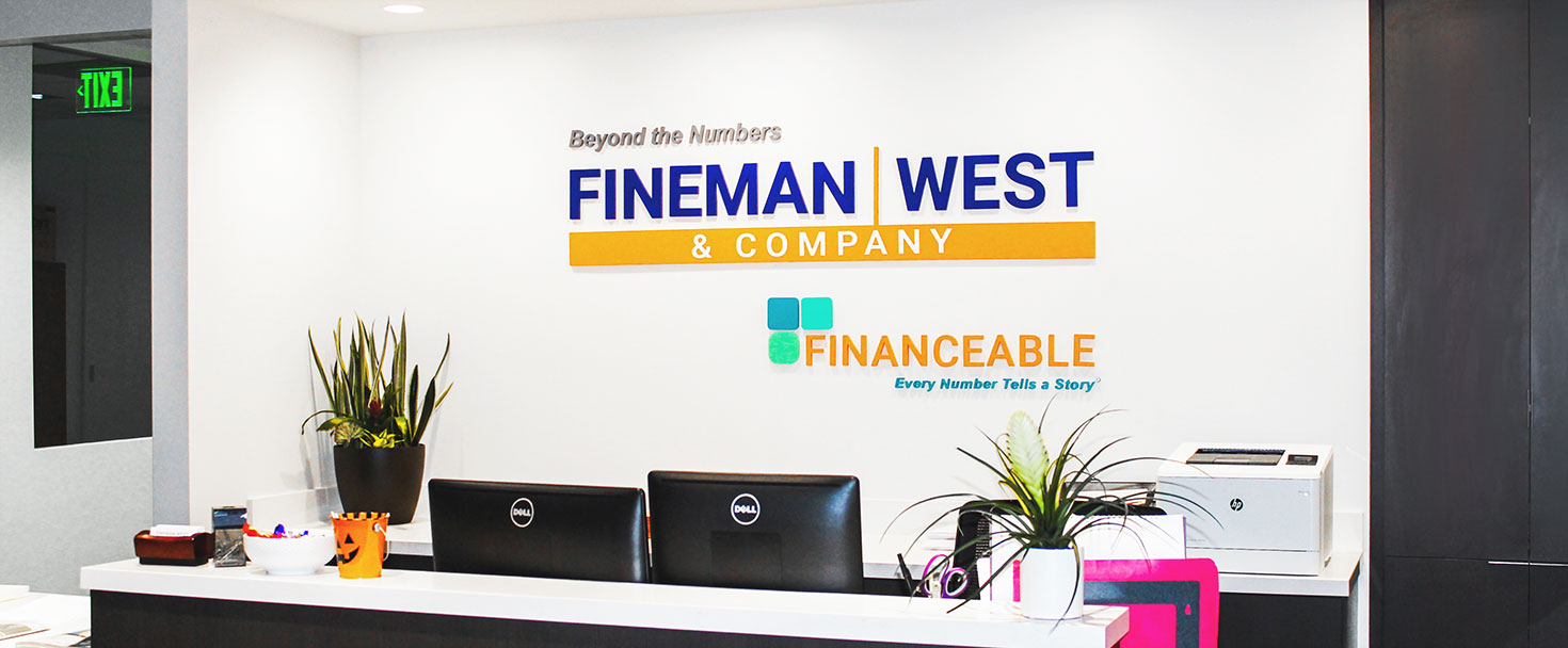 Fineman & West Company lobby signs made of acrylic for interior branding