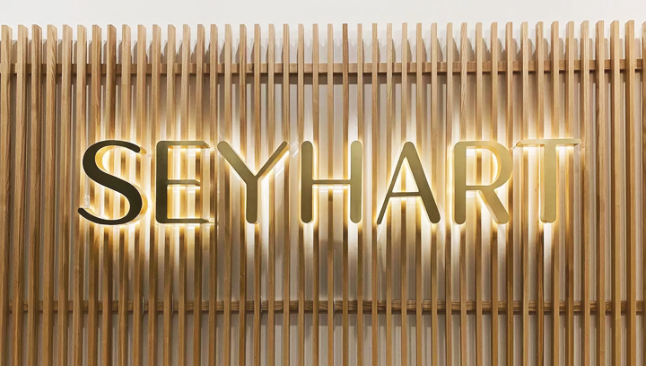 Seyhart illuminated office sign displaying the company name made of aluminum and acrylic