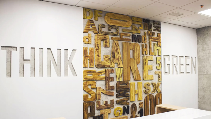 Ameriabank wooden office sign with custom cut letters for reception area design