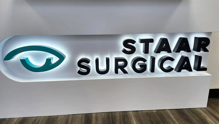 Modern lobby signs for Staar Surgical reception with back lighting made of acrylic
