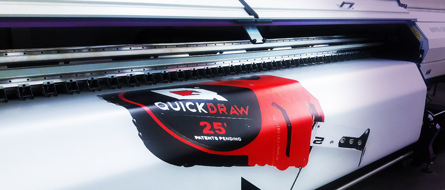 QUICKDRAW large format printing process on red and black vinyl banner