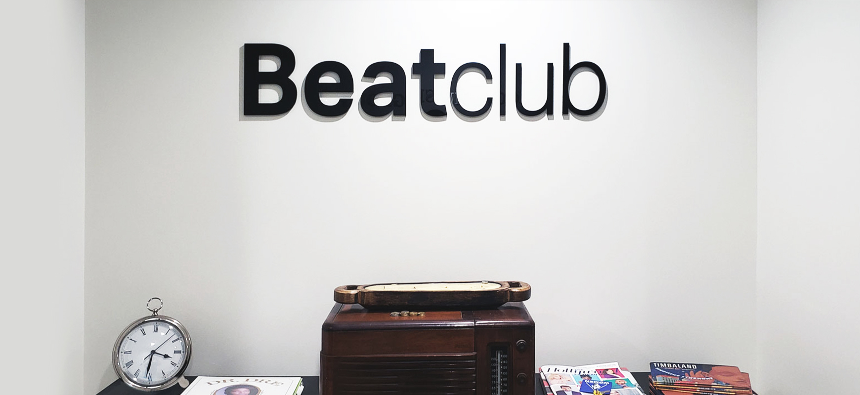 Beatclub office signage in black color displaying brand name 3D letters made of acrylic